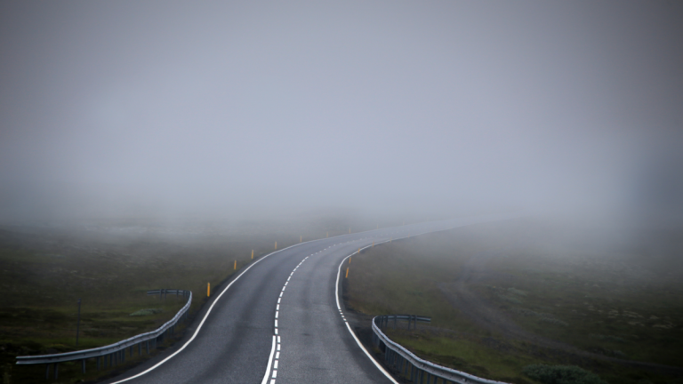 A photo of foggy road