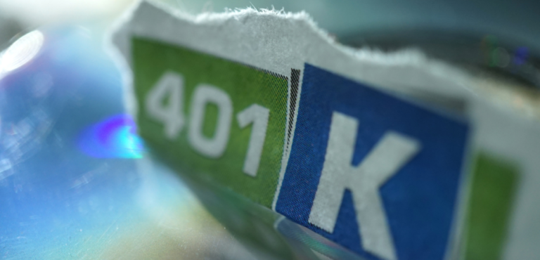 A photo of a torn piece of paper that says "401 in a green box and "K" in a blue box