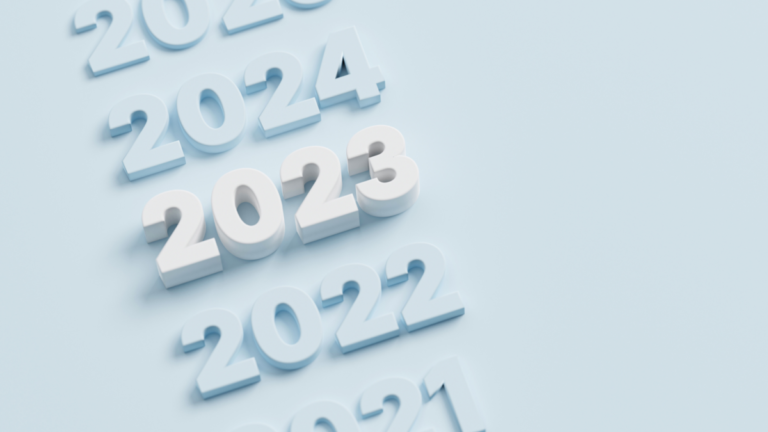 A light blue background with years going in a diagonal line - most are grey but 2023 is white.
