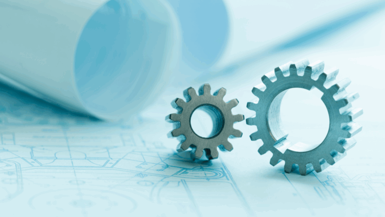 engineer or architect plans with two gears on top of it.