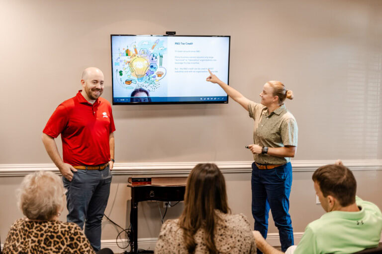 Two Avizo employees give a tax presentation