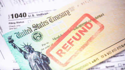An image of an IRS refund check with the text "REFUND" stamped over it in red.