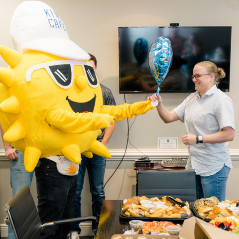 Kind Cafe's Sunshine giving Taylor a high five