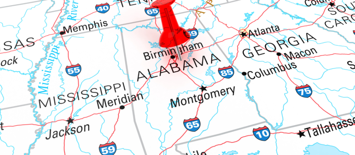 A map of the Southern United states with a red push pin in the state of Alabama