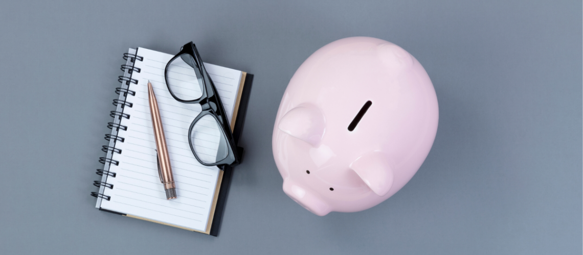 piggy bank and notebook