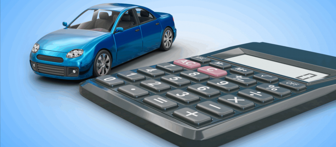 A photo of a calculator a blue toy car next to it.
