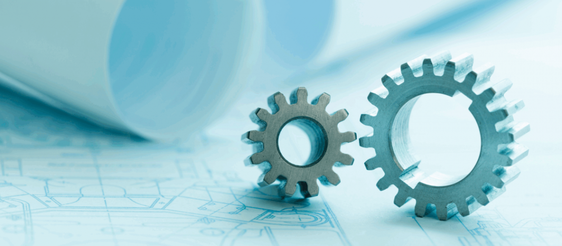engineer or architect plans with two gears on top of it.