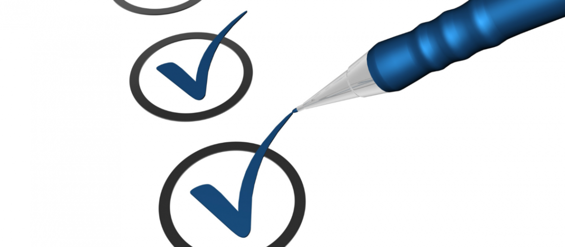 An image of a pen checking a check-list