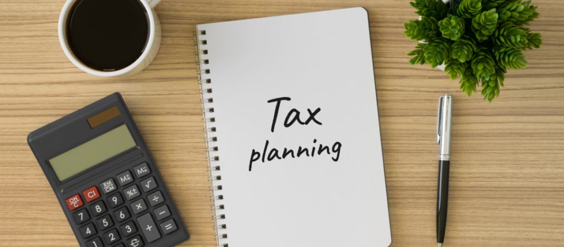 Tax planning notebook with calculator
