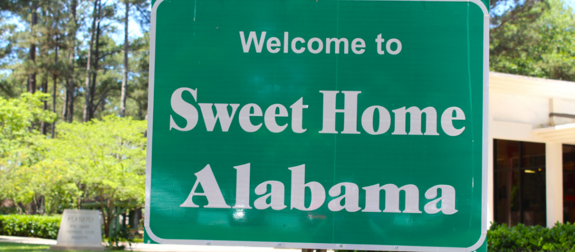 A road sign that says "Sweet Home Alabama"