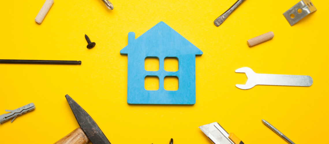 A yellow background with a cut-out of a blue house in the center. Various home repair tools are scattered around it.